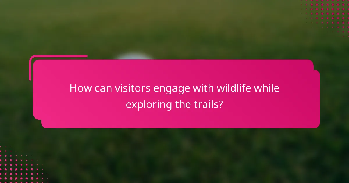 How can visitors engage with wildlife while exploring the trails?